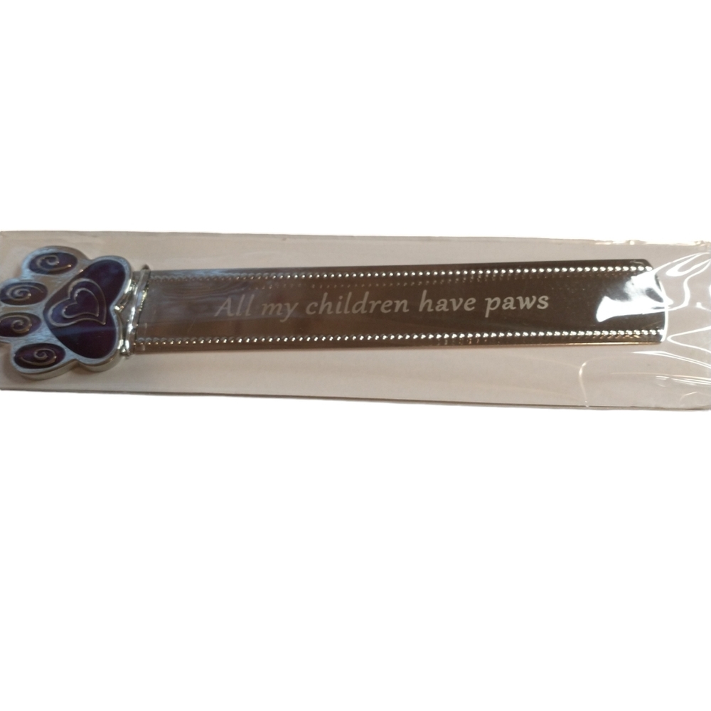 Bookmark for pet parents. Purple heart on pad of foot.